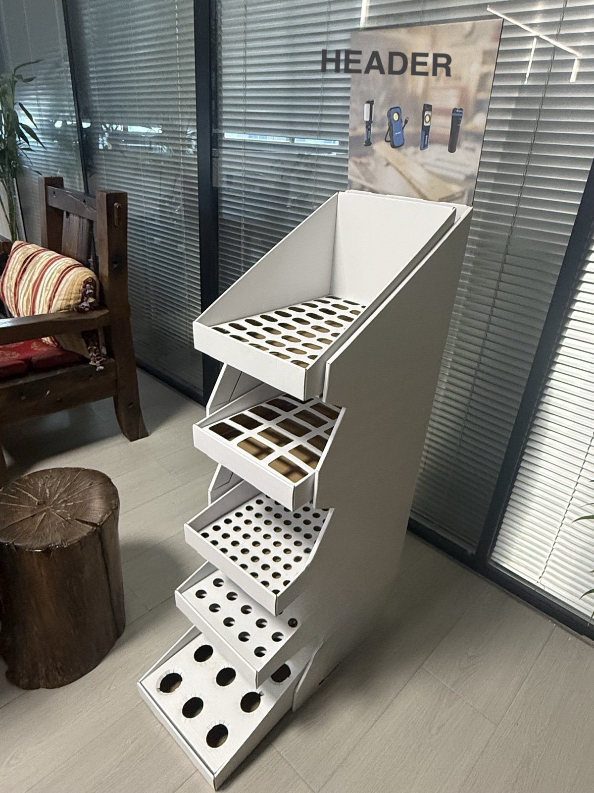Angled view of the 5-tier stepped floor display stand