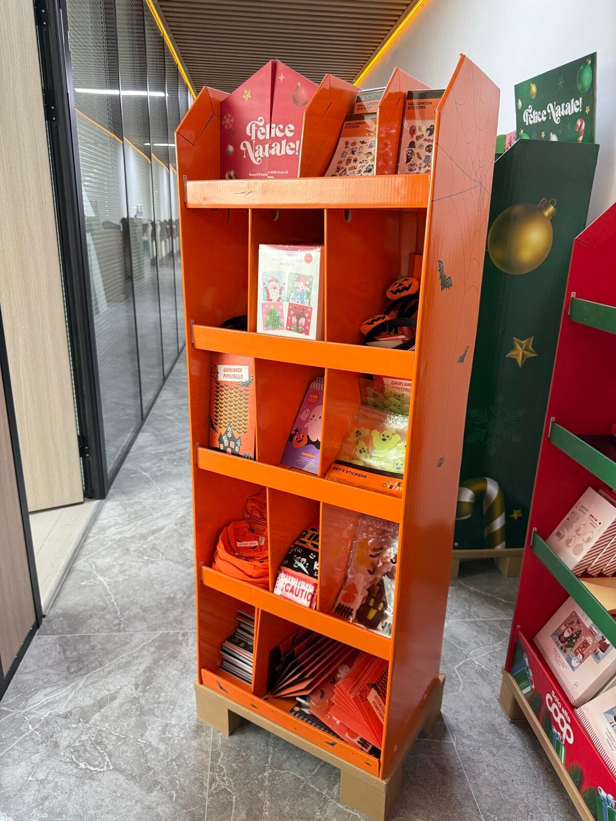 Angled front view of the R003 Halloween multi-compartment floor display with merchandise