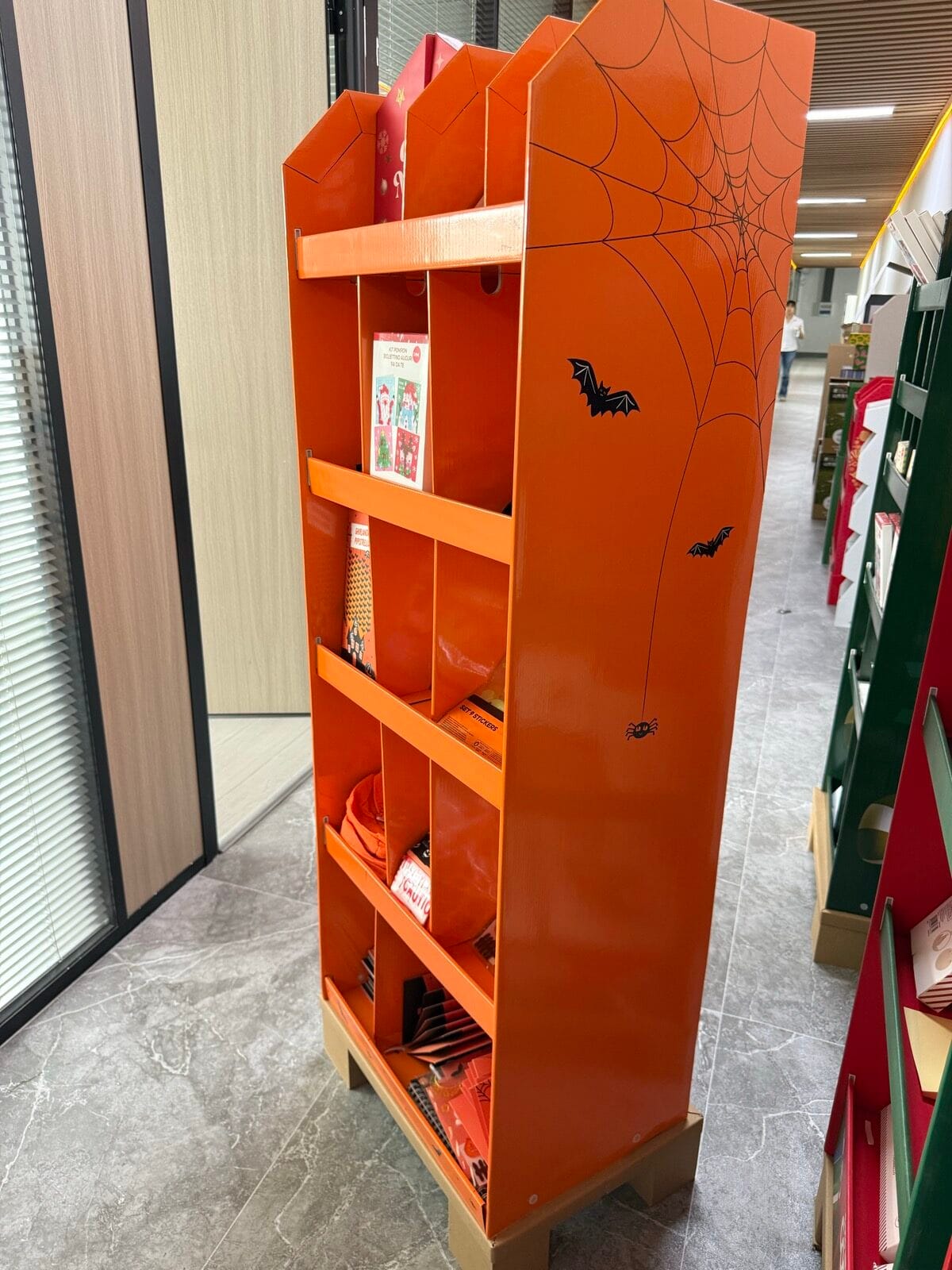 Side view of the R003 display showing compartment depth and side panel