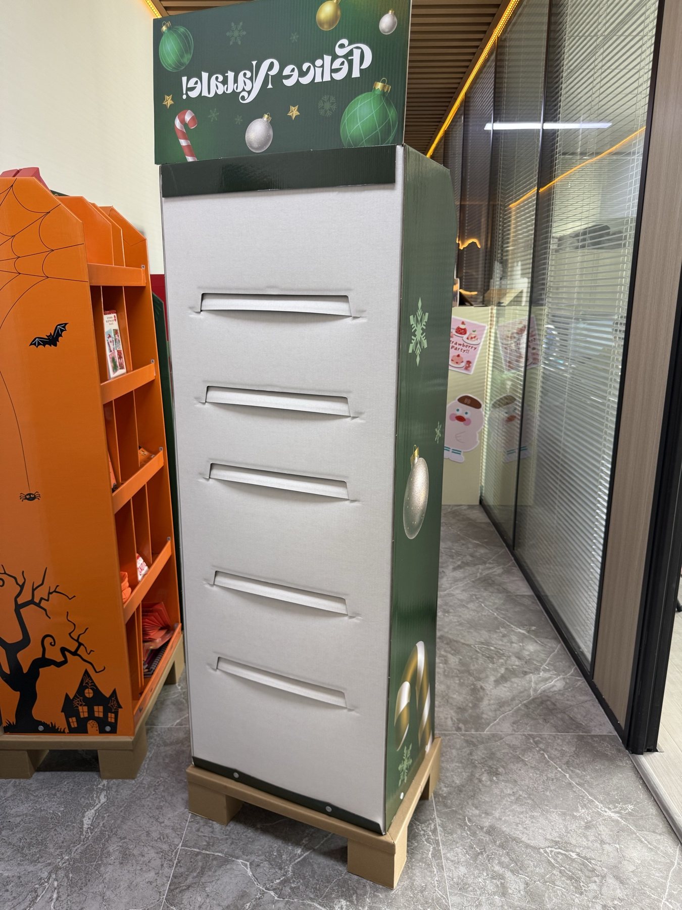 Rear view of Christmas display and corrugated support panels